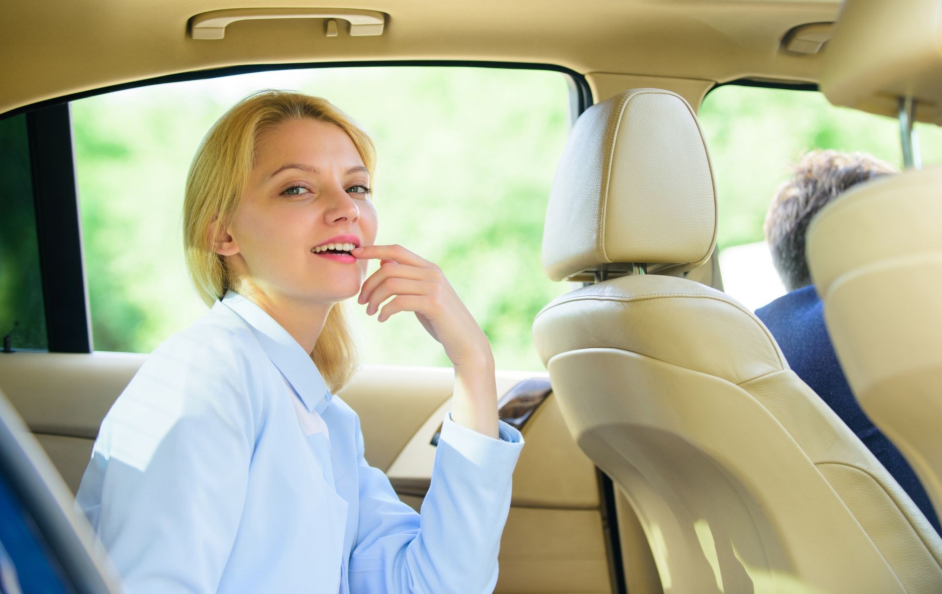 Business life concept. Business woman sit on backseat. Busy lady passenger leather car salon enjoy journey with chauffeur. Business lady passenger luxury car salon. Personal assistant and driver. Business life concept. Business woman sit on backseat. Busy lady passenger leather car salon enjoy journey with chauffeur. Business lady passenger luxury car salon. Personal assistant and driver.